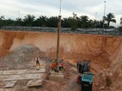 Installation of tremie pipe into borehole
